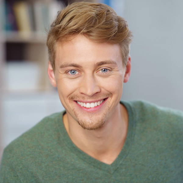 Young Man is Smiling